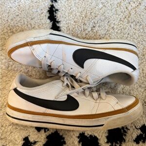 Nike White and Black Sneakers with Gold Accents